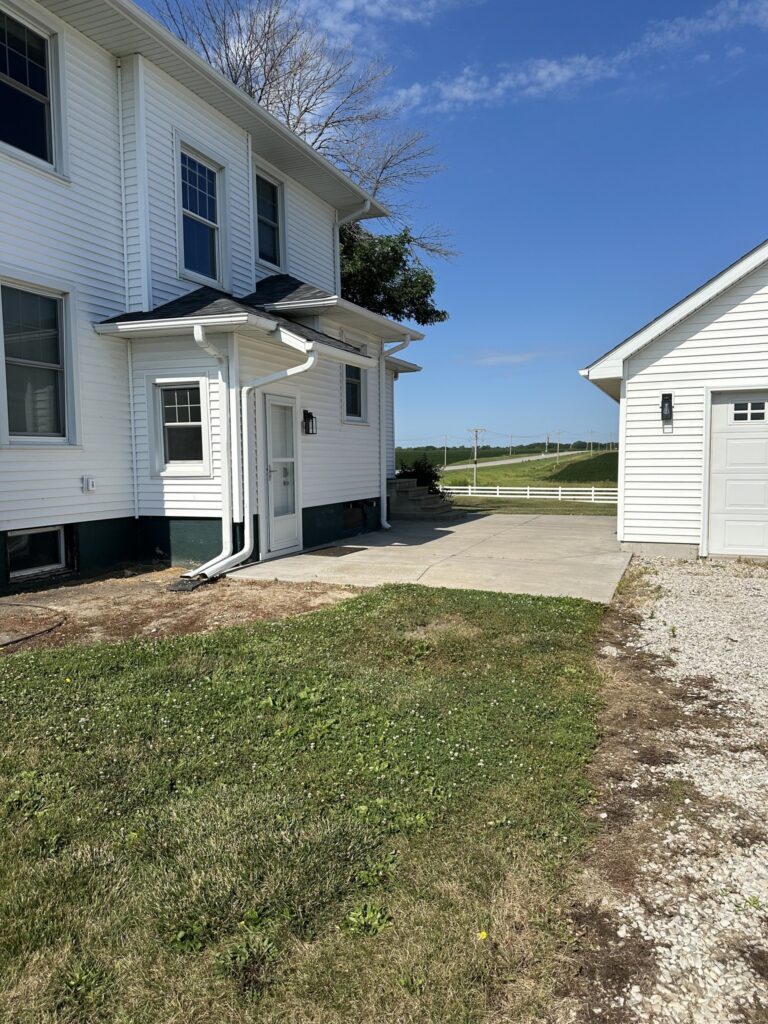 Farmhouse and detached garage at 13504 Hwy 78, Wapello, Iowa