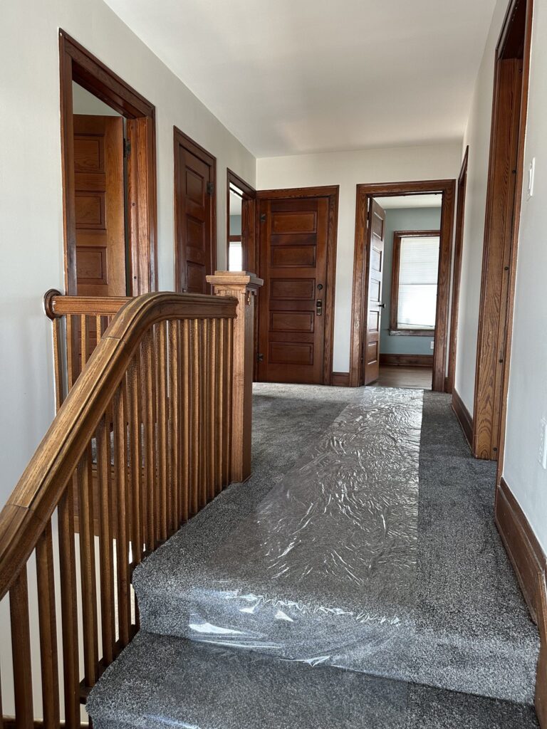 Entry hall and original wood staircase