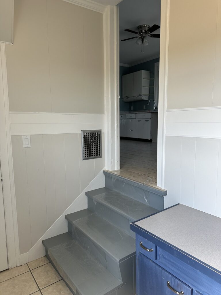 Back stairway leading to the kitchen