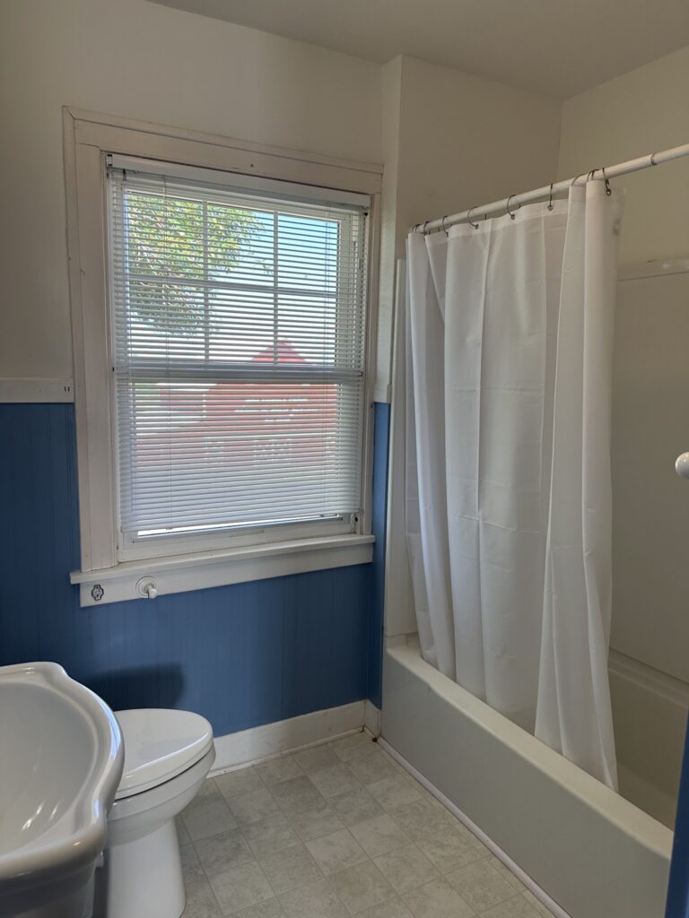 Bathroom with tub and shower